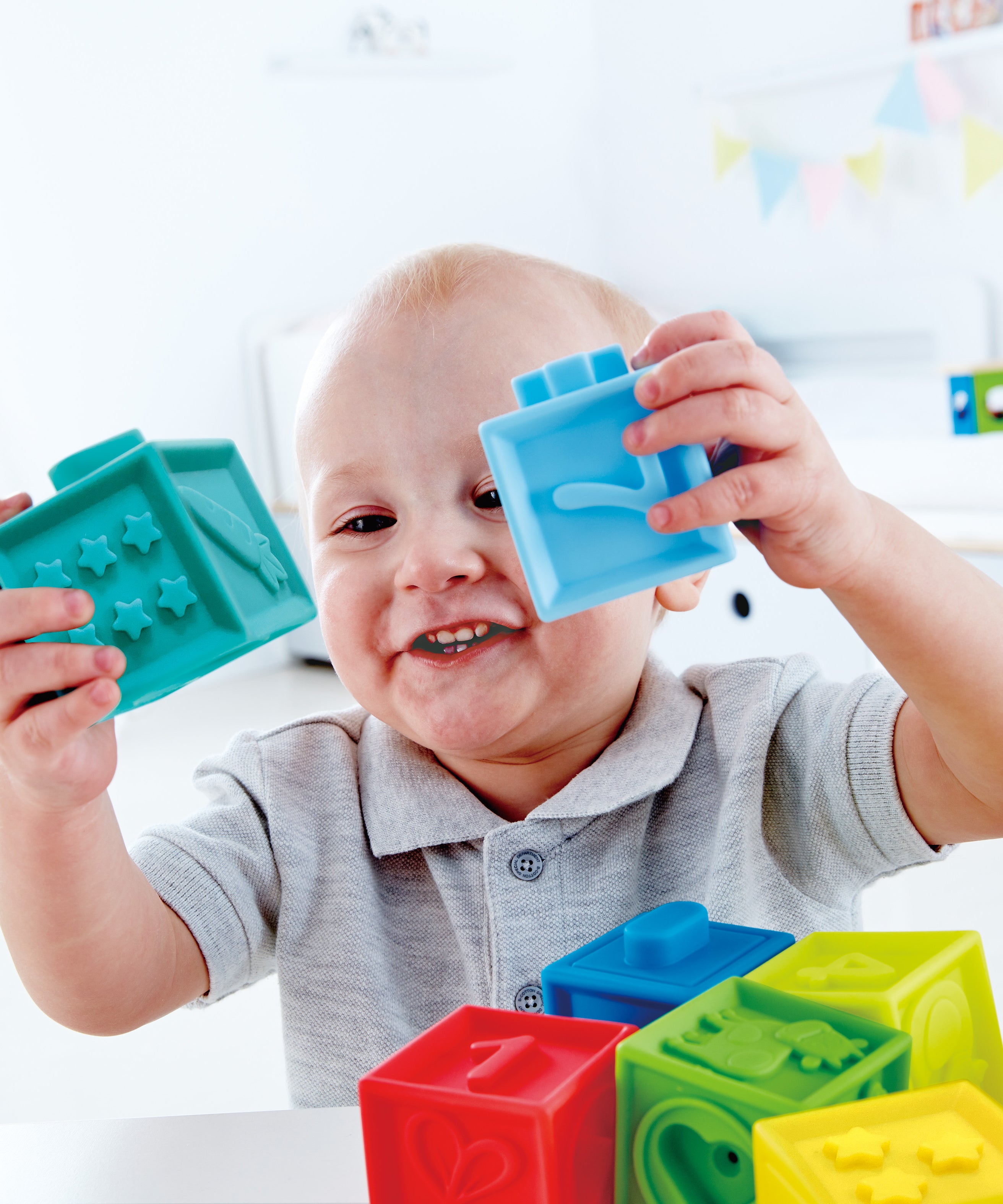 Hape Squeeze Me Blocks Soft Silicone Stacking Toy 10pcs – Colorful Textured Blocks for Teething, Stacking, and Early Learning