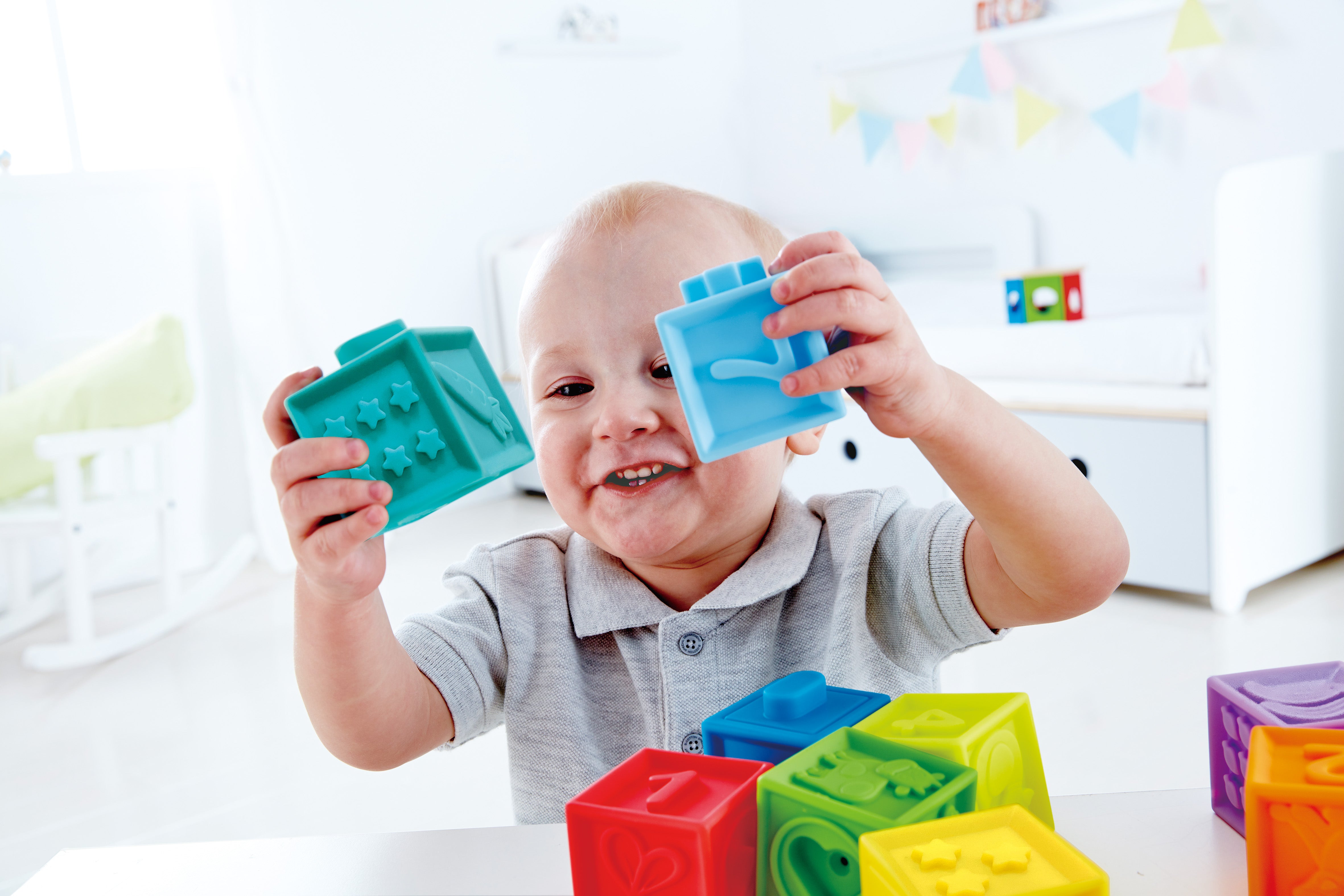 Hape Squeeze Me Blocks Soft Silicone Stacking Toy 10pcs – Colorful Textured Blocks for Teething, Stacking, and Early Learning
