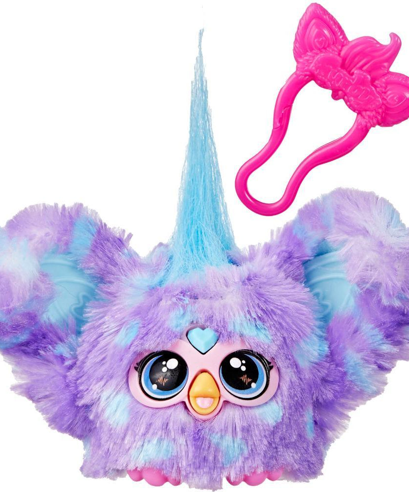 Colorful fluffy toy with a pink bow on a white background