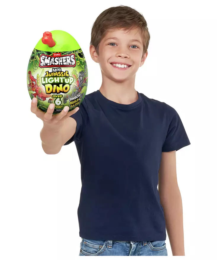 Zuru Smashers Mini Jurassic Light Up Dino - Over 6 Surprises, Unbox, Build & Battle Dino Fun for Kids 5+