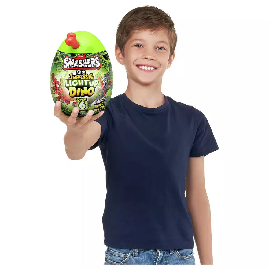 Zuru Smashers Mini Jurassic Light Up Dino - Over 6 Surprises, Unbox, Build & Battle Dino Fun for Kids 5+