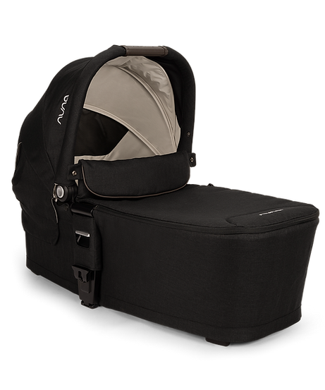 Nuna Lytl Carry Cot - Caviar | Compact Comfort for Your Newborn
