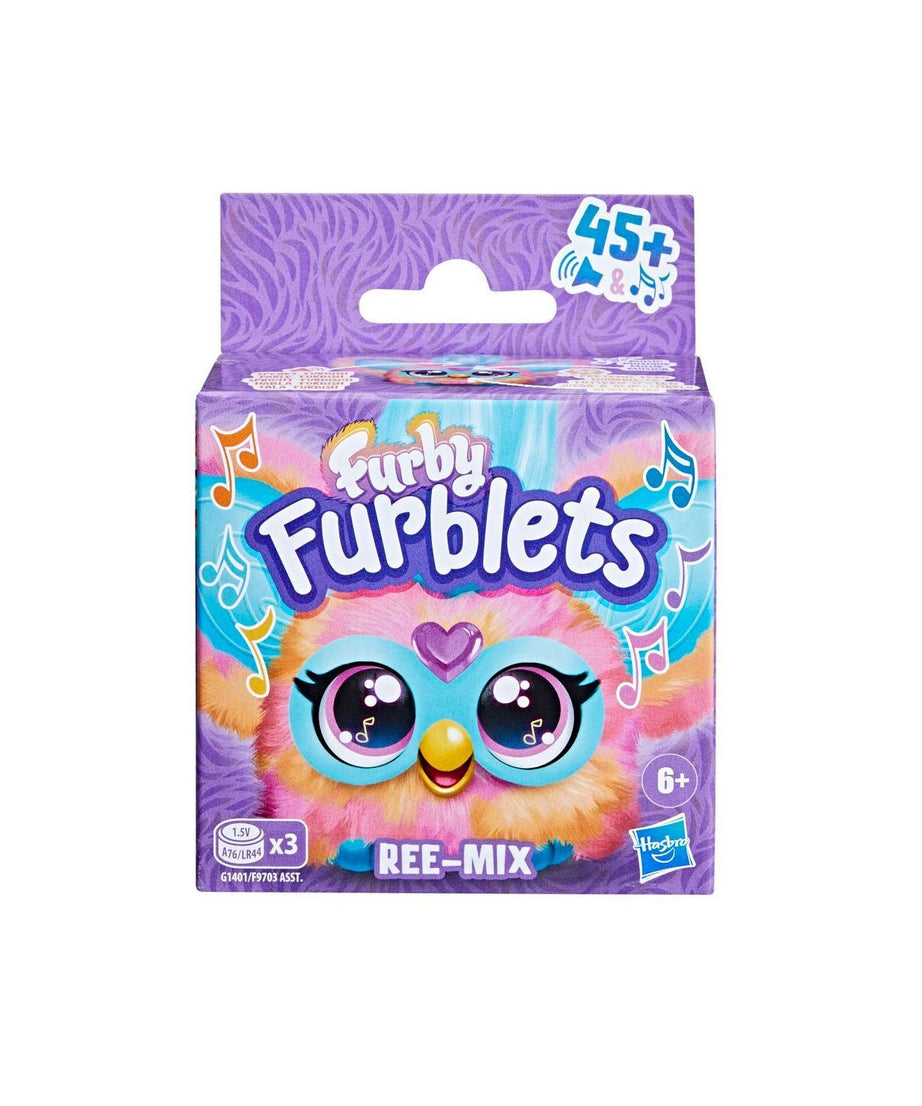 Packaging of Furbly Furblets toy with colorful design and purple background