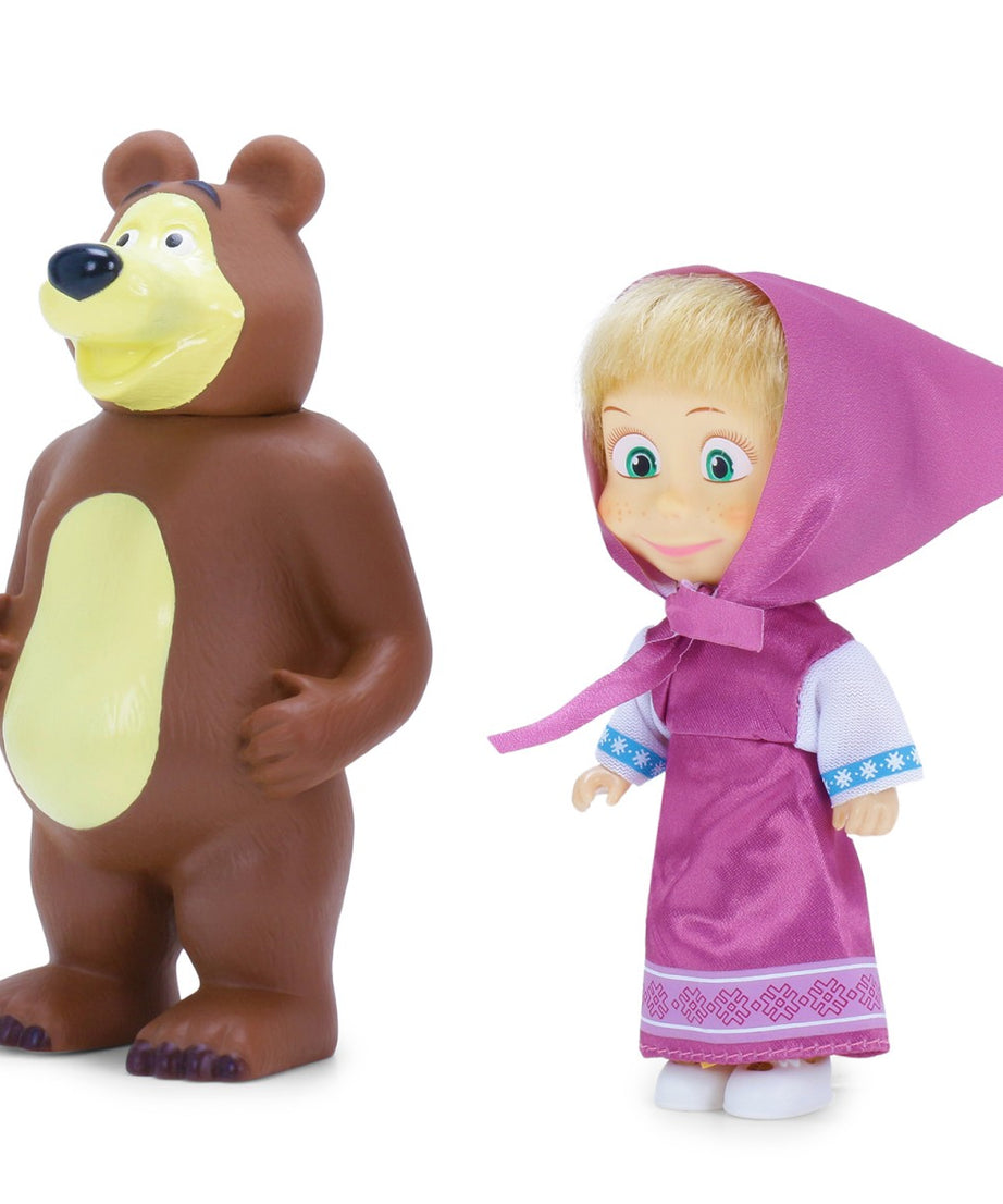 Toy bear and doll with pink hood on a white background