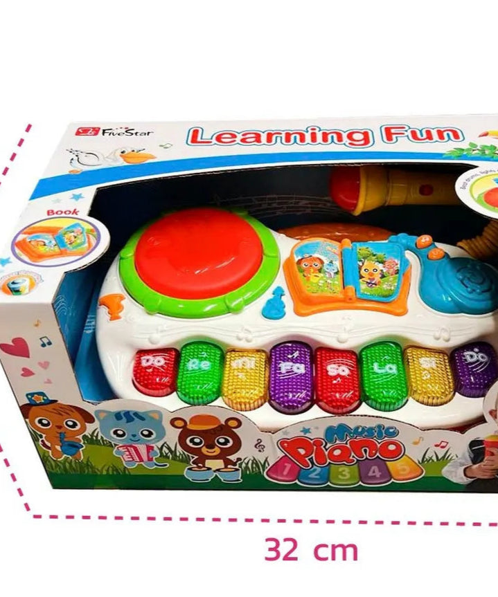 Toy piano with colorful keys and a child playing, branded 'Enfantasy', on a white background with dimensions indicated.