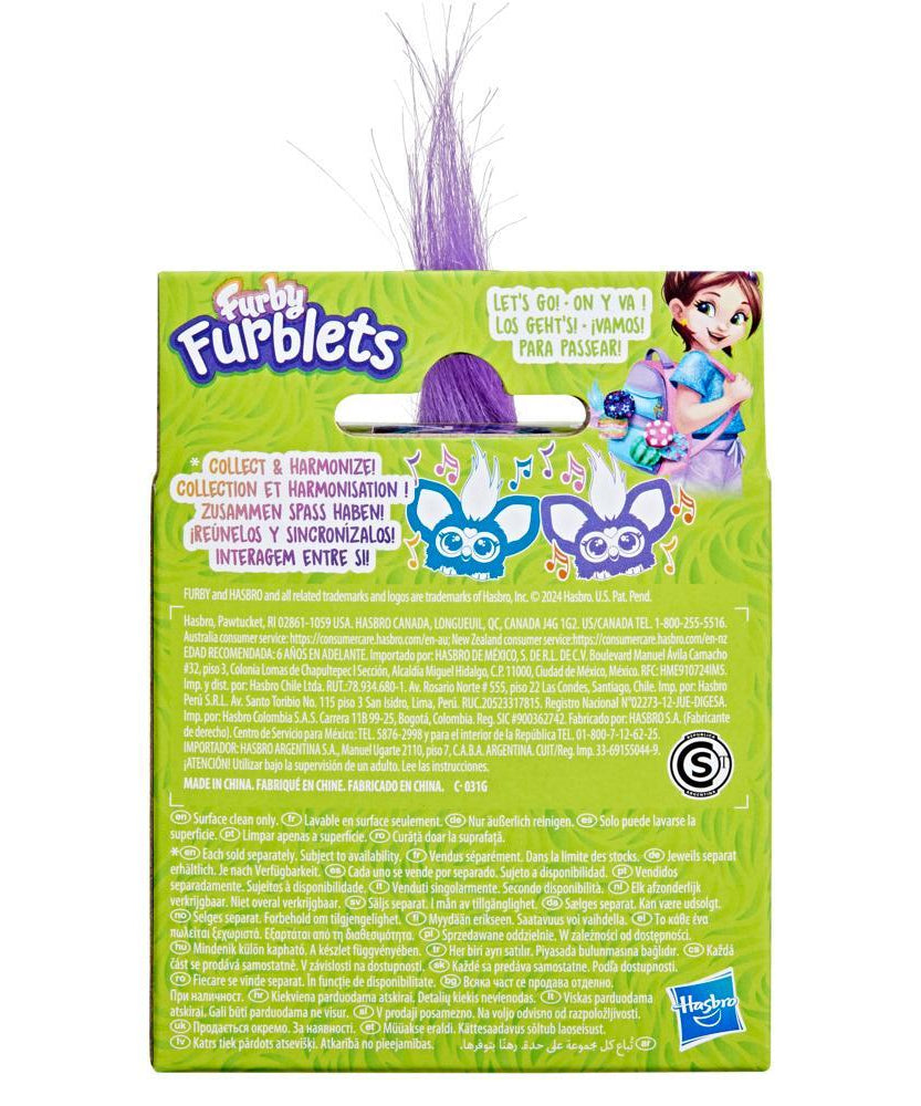 Furby Furblets toy packaging with purple hair on a white background