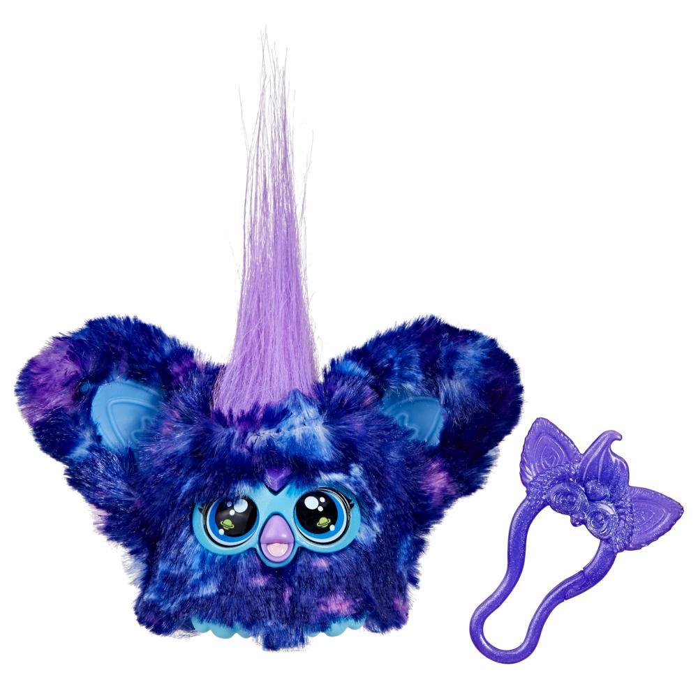 Blue and purple plush toy with a unicorn horn and butterfly clip on a white background